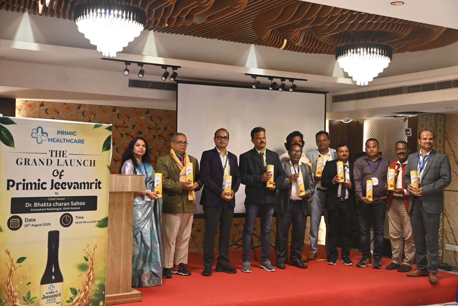 Grand launch of Primic Jeevaamrit, featuring guests and dignitaries on stage holding Jeevaamrit Juice bottles during the product launch ceremony.